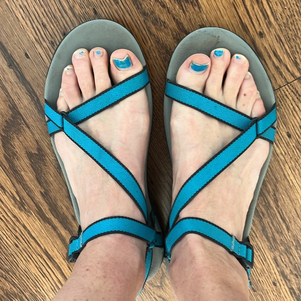 Teva sandals. With teal straps. In very good uses condition. Size 8.5